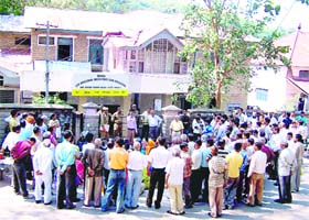Delegates from various social organisations hold a rally outside the office of the SDM at Sundernagar