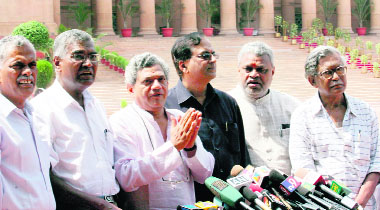 CPM leader Sitaram Yechuri addresses mediapersons as other leaders of the Left and the United National Progressive Alliance look on after submitting a memorandum at the Rashtrapati Bhawan against the governments decision to jettison the monsoon session of Parliament in New Delhi on Tuesday. 