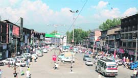 A Srinagar market brims with life after three days of the strike call on Tuesday. 