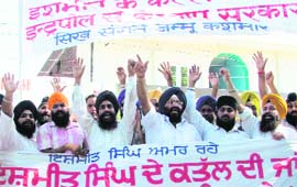 Members of various Sikh organisations plead for Interpol investigation into the death of Ishmeet Singh during a demonstration in Jammu on Wednesday. 
