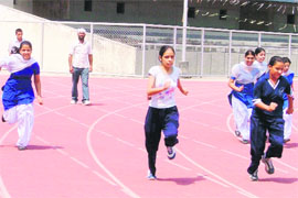 Visually impaired girls take part in trials conducted to select Punjab probables for the forthcoming national athletics meet to be held in November, at Guru Nanak Stadium in Ludhiana on Wednesday.
