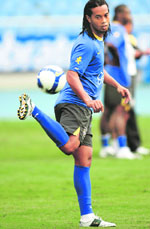 Brazil's soccer star Ronaldinho controls the ball during a soccer training session at Joao Havelange stadium in Rio de Janeiro ahead of the World Cup 2010 qualifying soccer match against Bolivia 