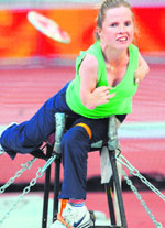 Catherine Wayland of Ireland takes a throw during the final of the women's discus F51-53 classification event at the Paralympic Games in Beijing on Wednesday. 