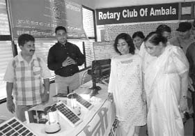 Haryana health minister Kartar Devi visits a stall at the Rotary Club in Ambala