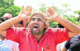 A staunch PUSU supporter gestures