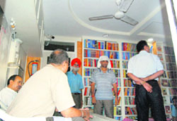 The Officials search the premises of publishers M/s Chattar Singh-Jeewan Singh in Amritsar
