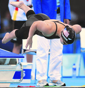 Erin Popovich of the US dives into the pool during the women's 100m freestyle S7 final at the Paralympic Games at the National Aquatics Centre in Beijing on Thursday.