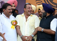 Abhay Singh Chautala, Bikramjit Singh Majithia, Punjab minister for information and public relations, Sanjay Dutt and Sukhbir Badal enjoy a lighter moment at the concluding ceremony of the 55th Senior National Boxing Championship in Bathinda on Friday; (right) Girls presenting a cultural programme on the occasion.