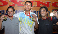 Pujab pugalists who clinched gold in the Senior National Boxing Championship showing their proud collection. 