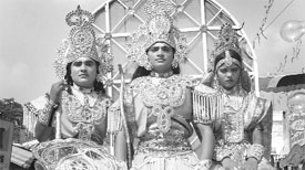 Artistes dressed as Lord Rama, Sita and Lakshmana in a shobha yatra taken out during Vaman Dwadshi in Ambala on Friday.