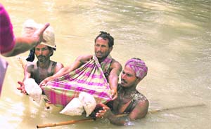 Such moving images of the floods in Bihar continue to haunt television viewers
