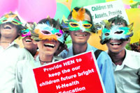 Children take part in a procession organised by the Indian Network for People Living with HIV/AIDS at Sector 17, Chandigarh, on Saturday