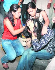 Two young girls help a scared friend in CP