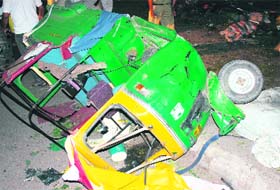 The damaged auto-rickshaw whose driver and passengers were critically injured after the blast at Gaffar Market