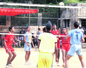 A volleyball match in progress during the district-level Inter-Block Rural Sports Tournament at Guru Nanak stadium in Ludhiana.