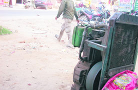 Residents are forced to use generator sets during power cuts, causing pollution, in Khanna.