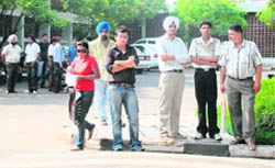 Students wait outside DUIs office over the confusion on admission criteria for general category in Chandigarh