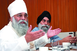 Jatinderpal Singh, president of Quest for Knowledge Foundation, addresses a press conference in New Delhi 