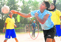 A referee can be seen in jeans instead of uniform during a match between PU Campus and MCM DAV College in the Panjab University Inter-College Handball Championship.