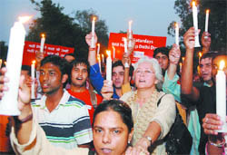 Social worker Nafisa Ali takes part in a silent candlelight march to express solidarity with the victims of Saturday blasts in New Delhi