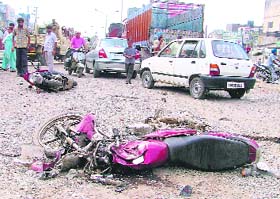 Smashed remains of the motor cycle which was hit by a truck