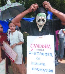 Central university teachers rally from Ferozeshah Kotla to UGC Bhawan against the Chaddha Committee's acts of misdemeanor on the issue of pay revision of teachers, in New Delhi