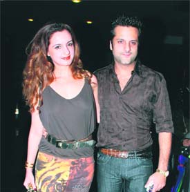 Fardeen Khan and his sister Laila Khan Rajpal make for a natty presence