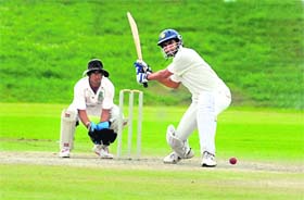 Munaf Patel of ONGC readies to hit a six against Assam during the J.P. Atray Tournament in Sector 16, Chandigarh
