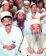 Muslims pray at the historic Alee Masjid, open to public after decades, in Srinagar