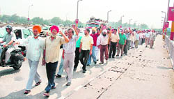 SRTC employees stage a demonstration in support of their demands in Jammu 