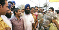 Farmers at the poultry stall on Thursday.