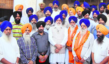 President of the SGPC Avtar Singh (centre) along with the members of a jatha in Amritsar on Thursday.