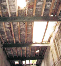 The roof of SHO’s room at the Mandi Ahmedgarh police station that has developed cracks.