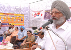 State information commissioner P.P.S. Gill addressing a seminar on RTI Act in Bathinda on Saturday. 