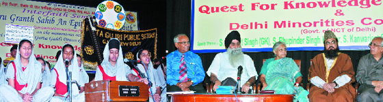 (Left) Students of Mata Gujri Public School, Greater Kailash, perform shabad kirtan on the occasion of the tercentenary of Gurta Gaddi Diwas in New Delhi on Saturday; and right: Chief Minister Sheila Dikshit, chairman of Delhi Minorities Commission Kamal Faruqui, Arnold James, Pushpinder Singh and Mufti Mohd. Mukaram Sahib at a seminar in New Delhi.
