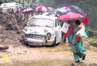 Heavy rain has affected life in the state. This particular stretch of road has been closed to normal vehicular traffic due to slush and landslides.