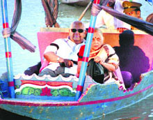Lok Sabha speaker Somnath Chatterjee and his wife enjoy a shikara ride at Sukhana Lake in Chandigarh on Sunday evening.