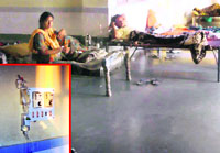 Hanging drips (Inset), makeshift arrangements for patients at the Raikot Civil Hospital.