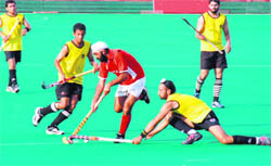 A match in progress between Chandigarh XI and J&K Police during the 38th S.N. Vohras Gurmit Memorial Hockey Tournament at Sports Complex, Chandigarh