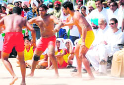 Readying for political kabaddi: Rahul Gandhi watches a kabaddi match in Mohali 