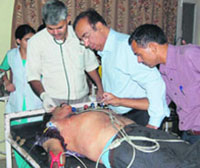Doctors try to revive Dr D.S. Chaudhary at the Civil Hospital in Bhiwani 
