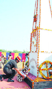Maj-Gen PS Paul, General Officer Commanding, Panther Division, lays a wreath at the Dograi War Memorial.
