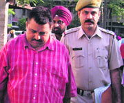 Rajinder Singh in police custody in Ludhiana on Monday.