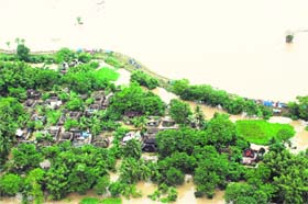 A view of submerged houses in flood-hit Jaipur village, 80 km east of Bhubaneshwar