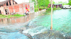 A flooded road at Burj village in Anandpur Sahib on Monday.