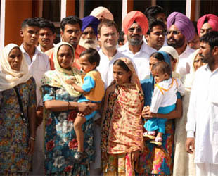 Rahul Gandhi, along with the kin of those Congress workers on whom atrocities were allegedly committed by the ruling Shiromani Akali Dal supporters in Bathinda on Tuesday.