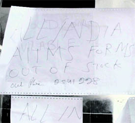 at the cash counter conveys that forms in the bank are out of stock.