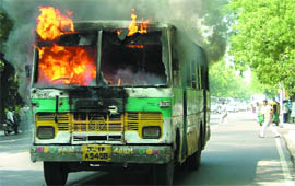 A Blueline bus plying on route number 181 caught fire due to short circuit at Parliament Street in New Delhi 