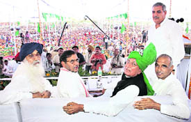 Punjab Chief Minister Parkash Singh Badal, former union minister Sharad Yadav and INLD supremo Om Prakash Chautala at a rally organised by the INLD in Bhiwani on Thursday.