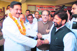 AICC general secretary Prithvi Raj Chauhan is welcomed by PCC chief Saifuddin Soz (second from right) before the start of the executive committee meeting in Jammu
